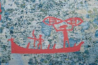 Stone Age rock painting depicting a fishing expedition
